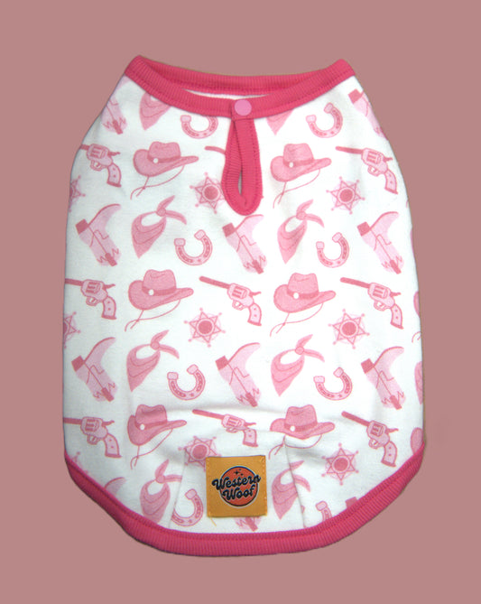 Dog shirt with pink cowboy pattern on a white background